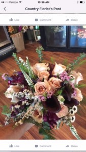 Creamy Plum bridal bouquet of roses, and lillies and monti casino