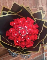 Crowned and jeweled wrapped roses  