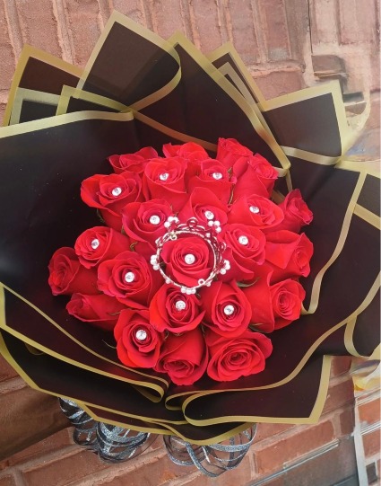 Crowned and jeweled wrapped roses