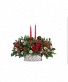 Crystal Christmas  Mercury glass filled with fresh winter greens and seasonal flowers