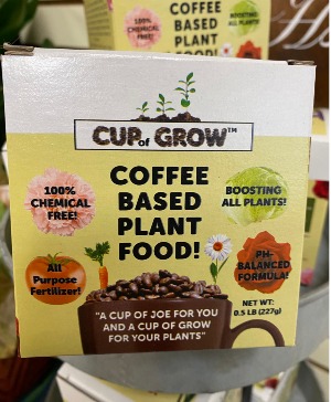 Cup of Grow Fertilizer for plants 