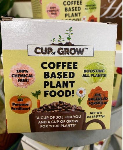 Cup of Grow Fertilizer for plants 