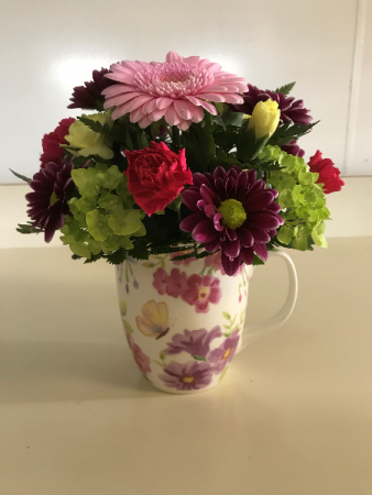 Cup of Spring Beauty Fresh Arrangement