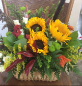 Custom basket of flowers Arrangement