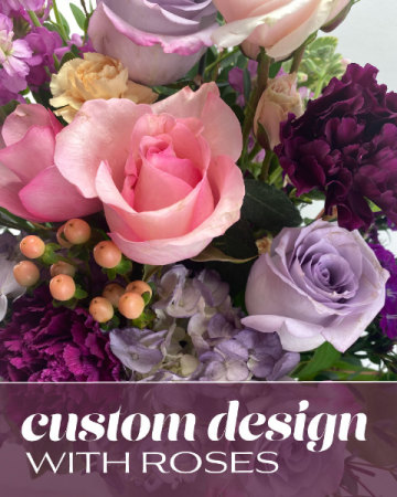 Custom Design with Roses Flower Arrangement in Nevada, IA | Flower Bed