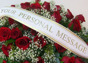 Custom Printed Sash or Bows in Charlottesville, VA | PLANTSCAPES FLORIST INC Custom Printed Sash or Bows in Charlottesville, VA | PLANTSCAPES FLORIST INC