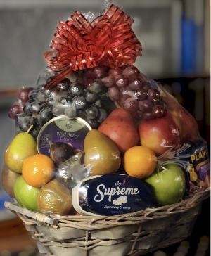 Custtom Hand made fruit basket. Made from fresh fruit , cheese, cracks  and candys.