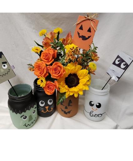 HALLOWEEM MASON JARS WITH Flowers and pic...we will choose what mason jars we have in stock...limited supply 