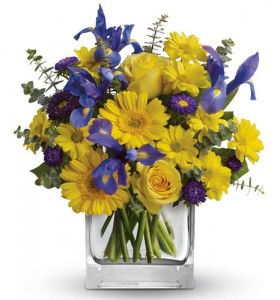 BLUE IRIS AND YELLOW ROSES AND OTHER YELLOWS ARRANGED IN A RECTANGULAR VASE!!