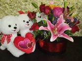 Cylinder with roses & Small Bear Floral arrangement 