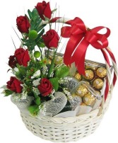 Flowers, chocolates in white Basket  