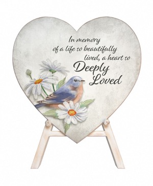 Deeply loved memorial heart on an easel  