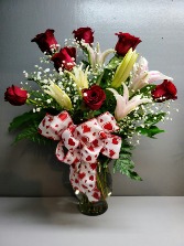 Deluxe Dozen Red Roses with lilies Vase arrangement 