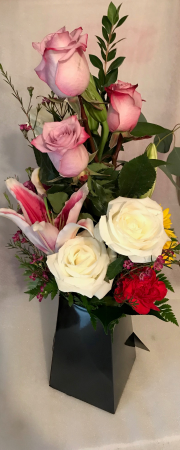Designer's Box Arrangement Colors and Flowers May Vary According to Price