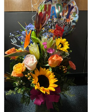 Designer's choice Birthday surprise Glass vase arrangement