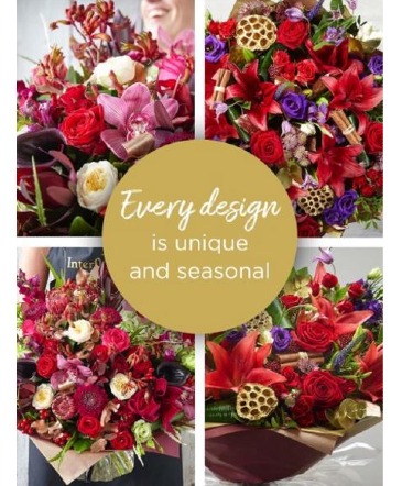 Designer's Choice Christmas Bouquet - NO VASE  in Calgary, AB | CROWFOOT PANDA FLOWERS CALGARY FLOWER DELIVERY