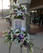 DOUBLE CROWN PICTURE FRAME MEMORIAL SPRAY  STANDING SPRAY W/2-CLUSTERS OF FLOWERS