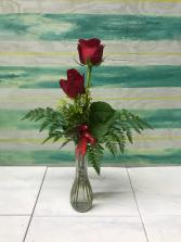 Double rose in bud vase 