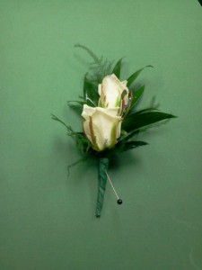 Double white spray rose boutonniere  