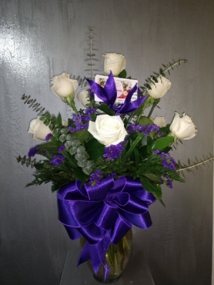 Dozen off white roses with purple accents  