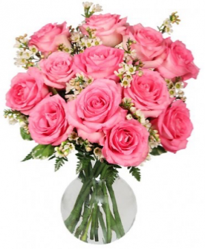 Sweet and Unique Roses Dozen pink roses arranged in a vase 
