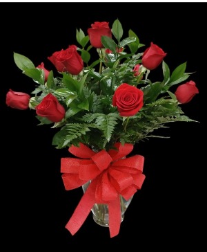 Dozen Red Roses with lush greens 