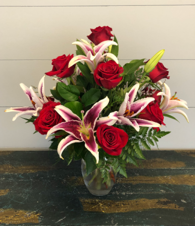 Dozen Red Roses with Oriental Lilies Vase Arrangement