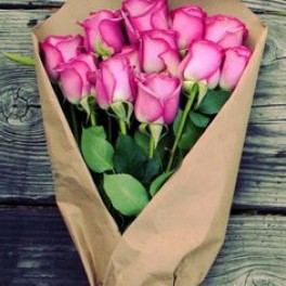 flowers wrapped in brown paper