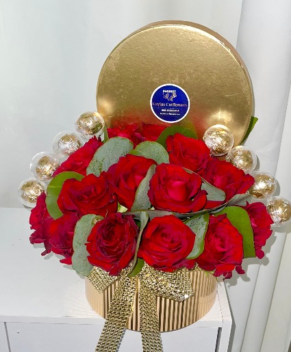 GOLDEN  BOX FLOWERS  Floral arrangement 