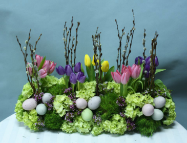 Easter dinner table arrangement  A real show stopper in Ozone Park, NY | Heavenly Florist