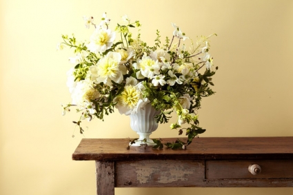 Elegance in Bloom Mixed Blooms in White Urn