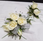 Elegant in white Wrist corsage and boutonniere