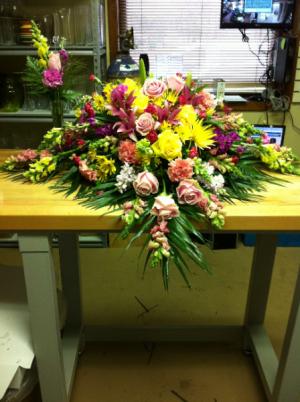 Elegant Pink and Yellow Casket Tribute Funeral Flowers