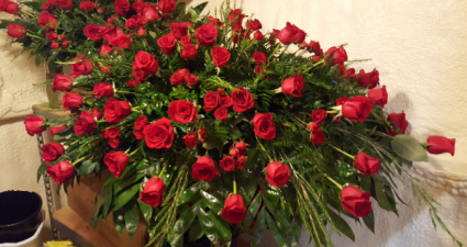 elegant red rose casket spray