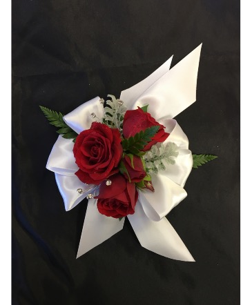 Elegant Red wrist corsage in Arlington, WA | What's Bloomin' Now Florist Gifts Flower Delivery