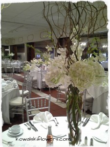 Elegant White Tall Reception Centerpieces in Whitesboro, NY | KOWALSKI FLOWERS INC. Elegant White Tall Reception Centerpieces in Whitesboro, NY | KOWALSKI FLOWERS INC.