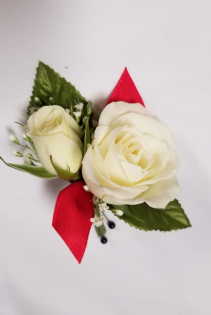 Elegant white with a touch of red Boutonniere