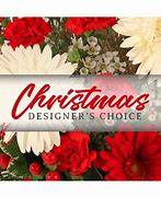 Enchanted Designs Seasonal Bouquet During this time of COVID19 we ask that you allow our designer's to create a beautiful bouquet with the seasonal flowers we have available at this time. Thank you!