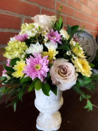 English Country Garden Gorgeous seasonal blooms arranged in a vintage-look compote container.