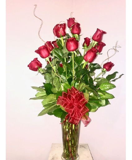 Eternal Love 18 long stem Red Roses beautifully arranged in a vase
