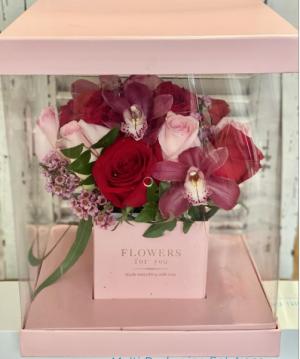 Everlasting Love Dozen Rose's w/orchids. Unique gift box adorned w/ upgraded fillers.