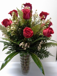 Exquisite Dozen Red Rose Arrangement In a Crystal vase