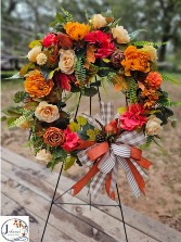 Fall Grapevine Wreath displayed on easel 