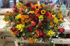 FALL SYMPATHY CASKET SPRAY 
