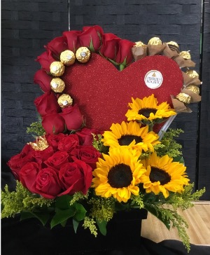 Ferrero Roscher Roses and Sunflowers Container Arrangement 