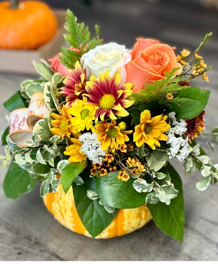Floral pumpkin  fresh sugar pumpkin with fresh flower arrangement