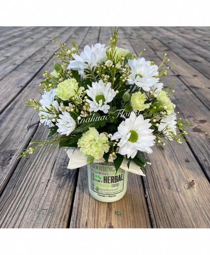 Flowering Candle Arrangement Fresh flowers with our highly scented candle