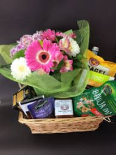Flowers and Goodies for Mom gift basket with a wrapped bouquet