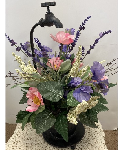 Flowers growing under the Faucet Permanent botanical