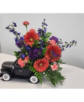 Flowers on the move Metal truck arrangement 